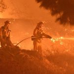 California faces huge power cuts as wildfires rage